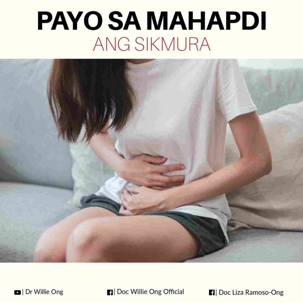 Photo showing a teenage girl experiencing stomach aches